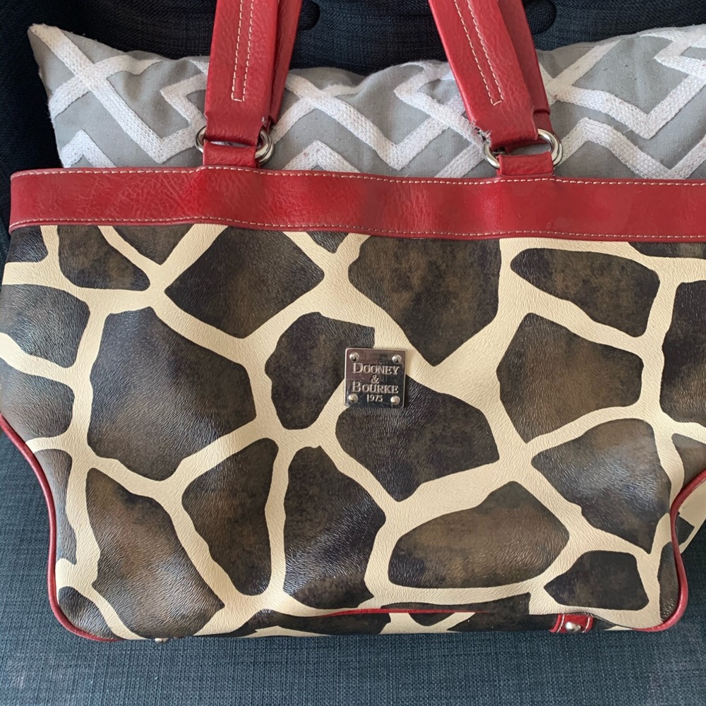 Dooney and Brooke giraffe print purse.